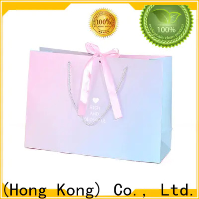 Welm waterproof striped paper bags wholesale for shopping